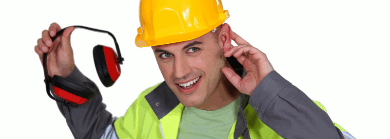 A workman in hard had and fluorescent vest holds hearing protection and a hand behind his ear